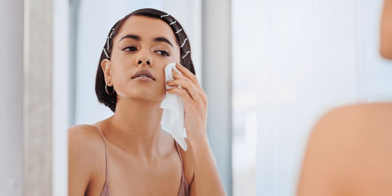 Checking face in mirror